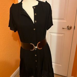NWT Davi & Dani black short sleeve dress. Has eyelet lace on bottom. Size S